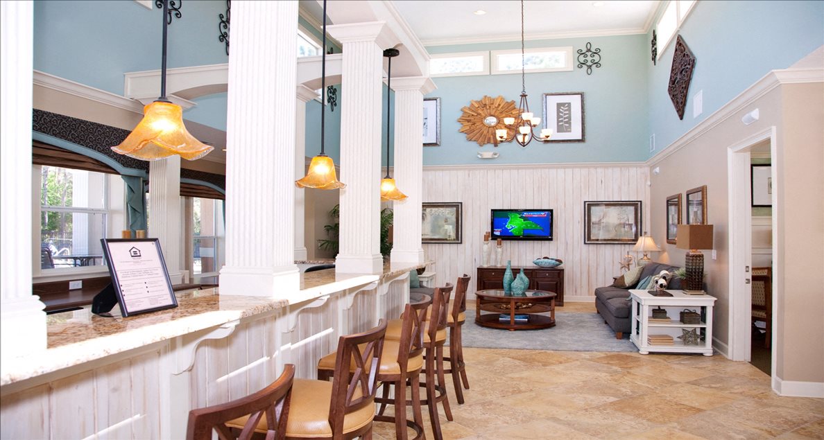 Exquisite clubhouse with bar seating at The Columns at Cypress Point, 4330 Point Cypress Boulevard,  Wesley Chapel, Florida 33545